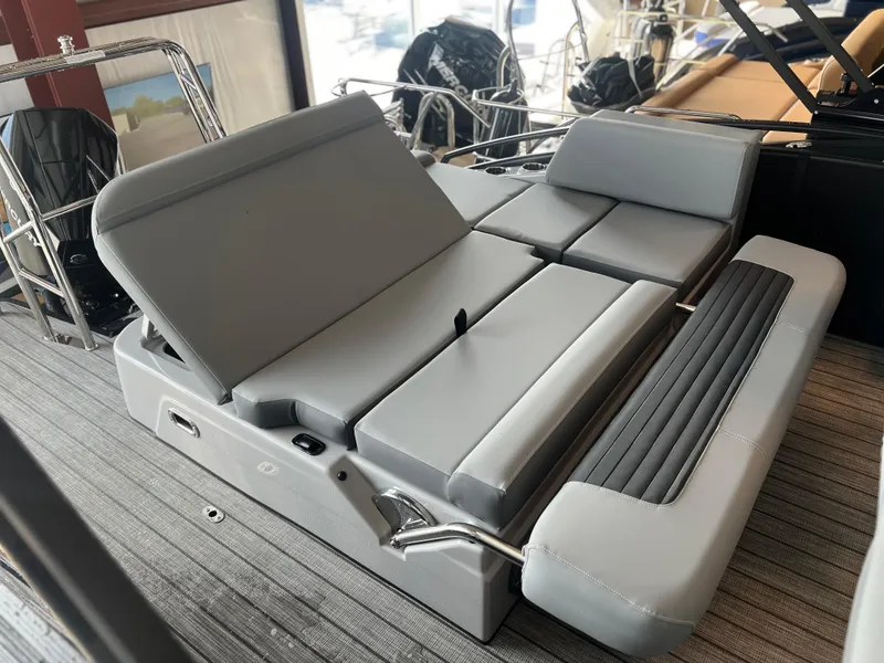 Slide: The Image of 2024 Harris Solstice 230 boat interior with adjustable gray seating. - 25