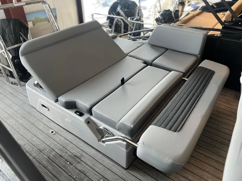 Slide: The Image of 2024 Harris Solstice 230 boat with luxurious gray seating and adjustable backrests. - 26