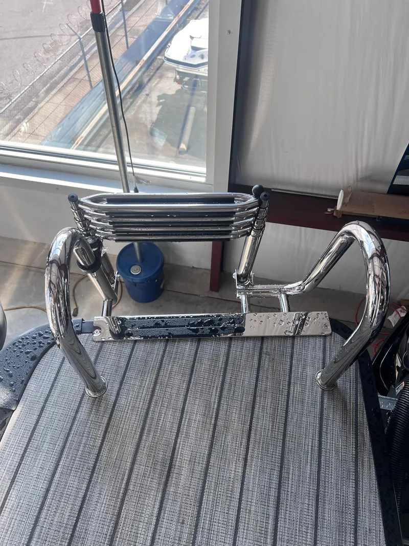 Slide: The Image of 2024 Harris Solstice 230 boat ladder and deck detail. - 30