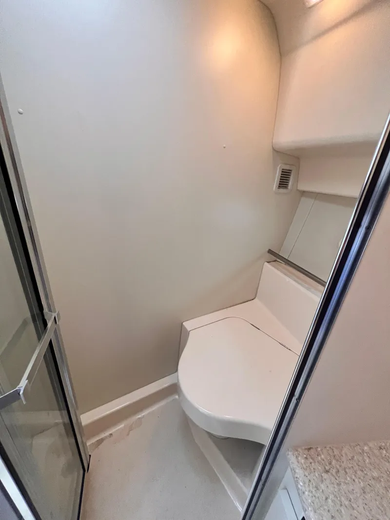 Slide: The Image of 2001 Silverton 352 Motor Yacht bathroom with shower and toilet - 19