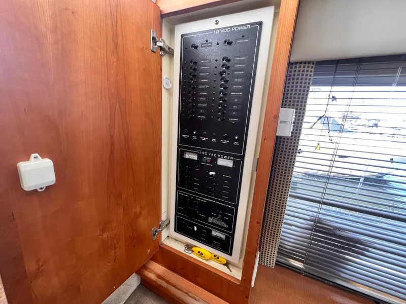 Slide: The Image of Electrical control panel inside a 2001 Silverton 352 Motor Yacht. - 29