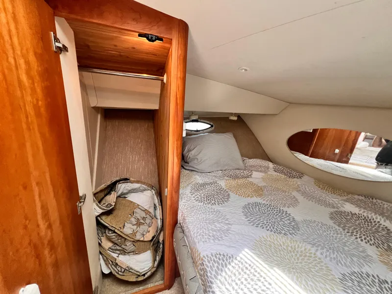 Slide: The Image of Interior cabin of 2001 Silverton 352 Motor Yacht with bed and closet. - 30