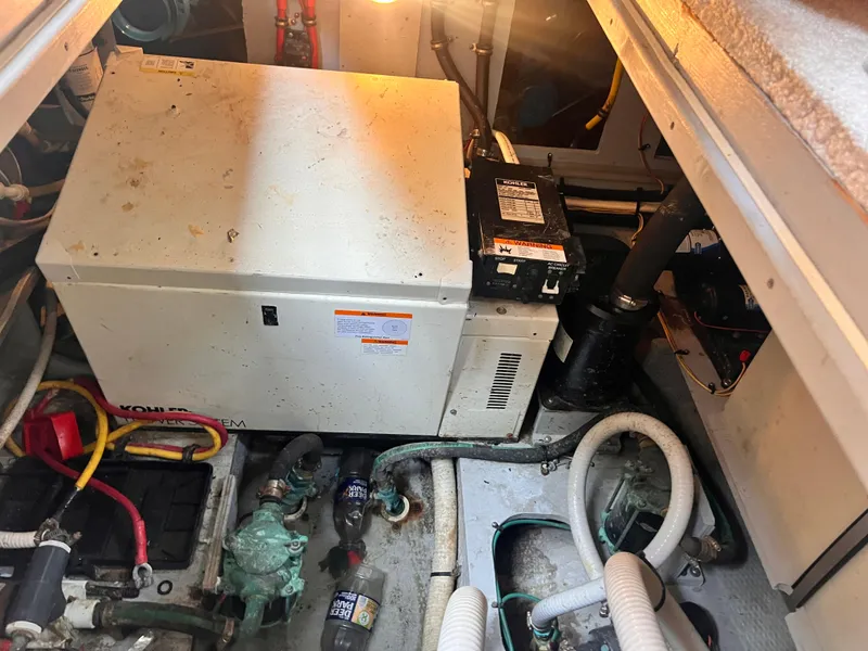 Slide: The Image of Engine room of a 2001 Silverton 352 Motor Yacht with Kohler generator. - 32