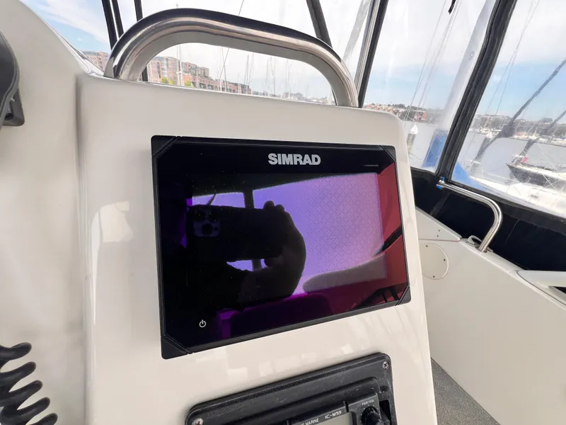 Slide: The Image of Simrad navigation system on a 2001 Silverton 352 Motor Yacht. - 42