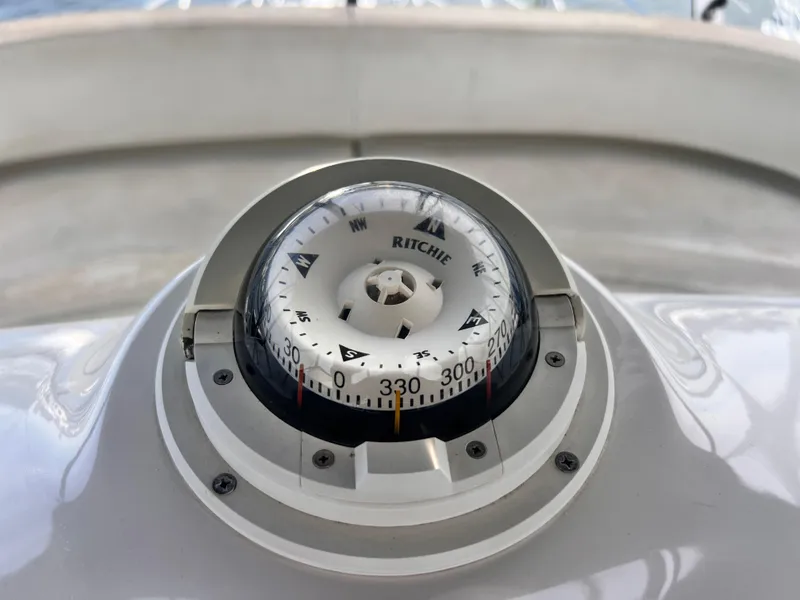 Slide: The Image of Close-up of a Ritchie compass on a 2001 Silverton 352 Motor Yacht. - 47