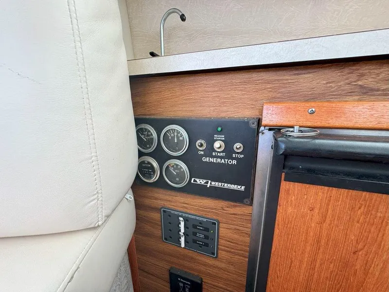 Slide: The Image of Control panel and outlets on 1985 Sea Ray 390 Sedan Bridge yacht. - 25