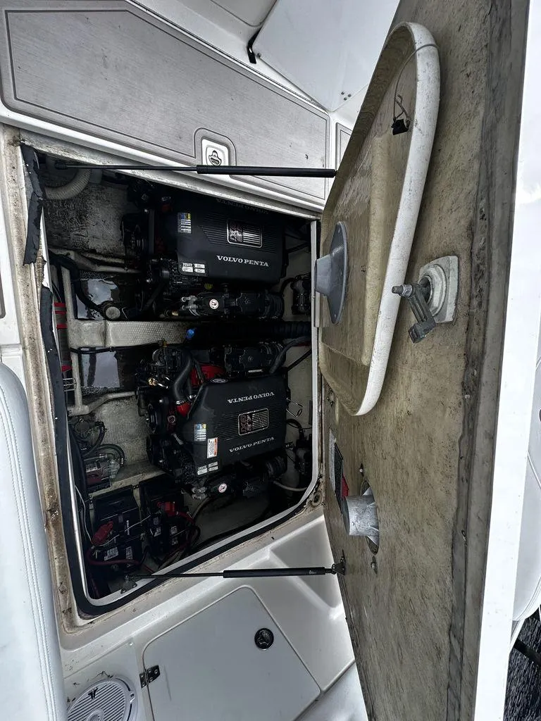 Slide: The Image of Engine compartment of a 2005 Regal Commodore 27 boat with Volvo Penta engines. - 11