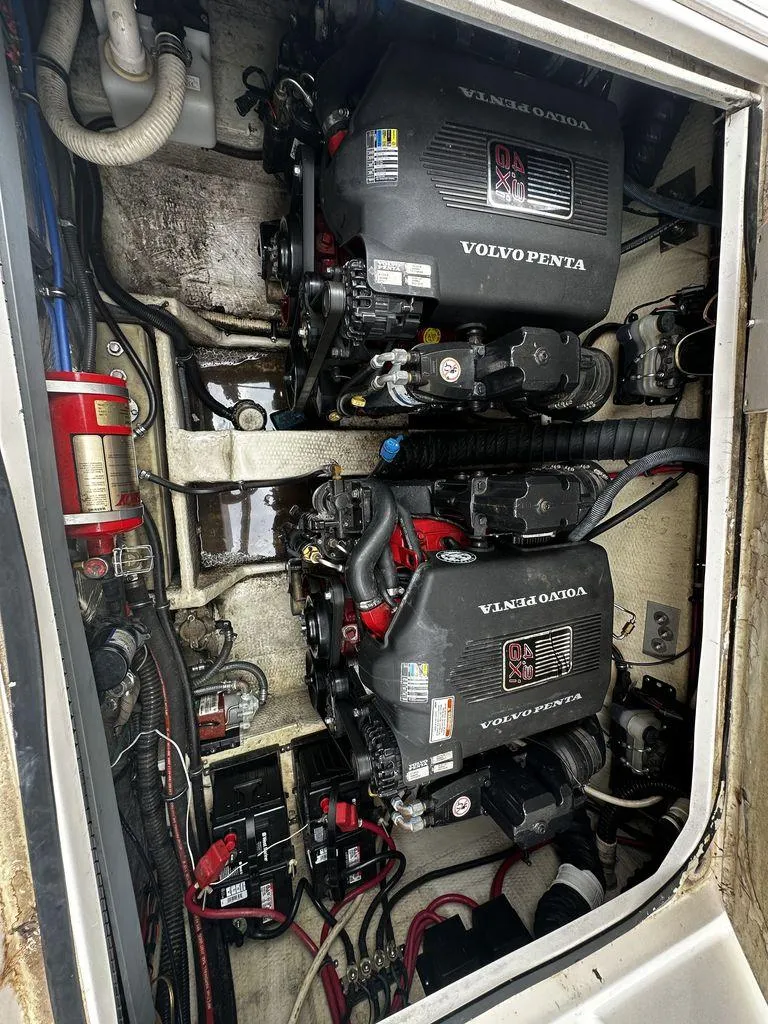 Slide: The Image of Engine compartment of a 2005 Regal Commodore 27 with twin Volvo Penta engines. - 13