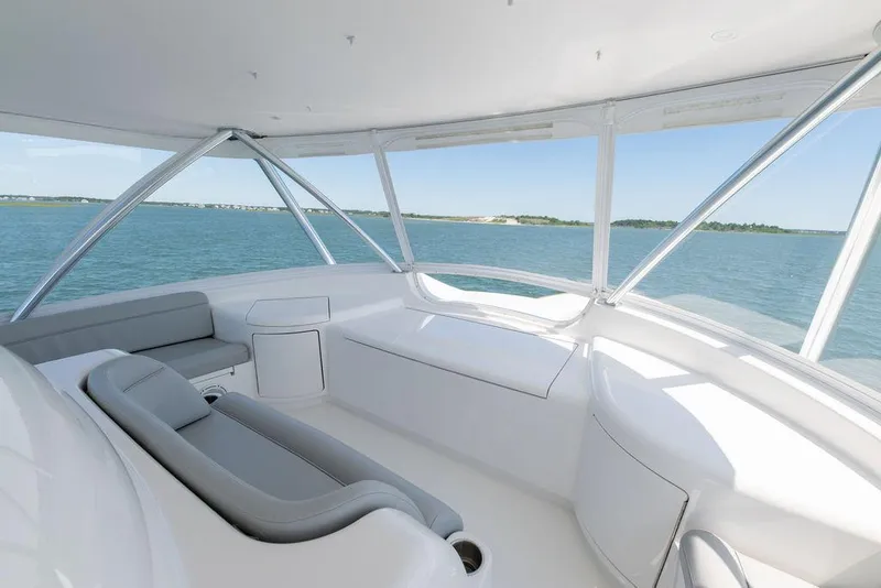 Slide: The Image of Interior view of 2017 Viking 72 Convertible yacht with ocean backdrop. - 18