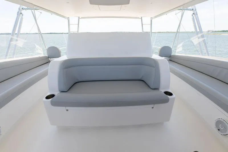 Slide: The Image of 2017 Viking 72 Convertible yacht interior seating area with panoramic windows. - 19