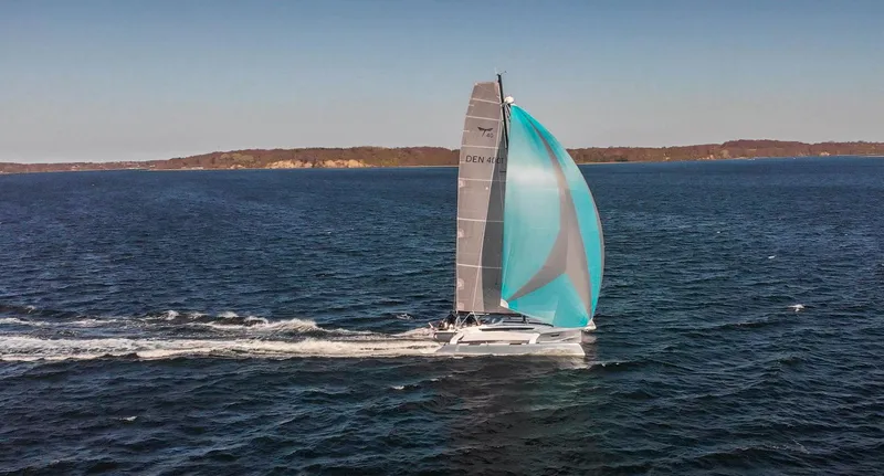Slide: The Image of Sailing yacht Dragonfly 40 gliding on open sea, 2026 model. - 1