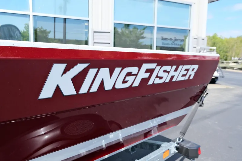 Slide: The Image of 2024 KingFisher 1825 Falcon boat, red exterior, close-up view. - 17