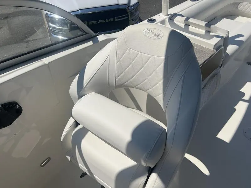 Slide: The Image of 2025 Key West 239 DFS boat seat, white leather, interior view. - 10