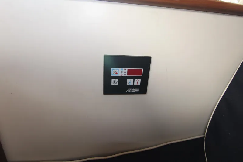 Slide: The Image of Control panel on 2007 Luhrs 28 Open boat interior wall. - 14