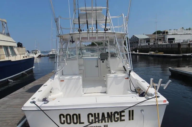 Slide: The Image of 2007 Luhrs 28 Open boat docked at marina, rear view. - 23