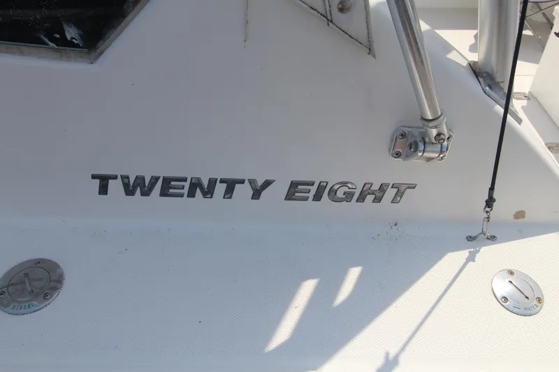 Slide: The Image of 2007 Luhrs 28 Open boat with "Twenty Eight" text on the side. - 3