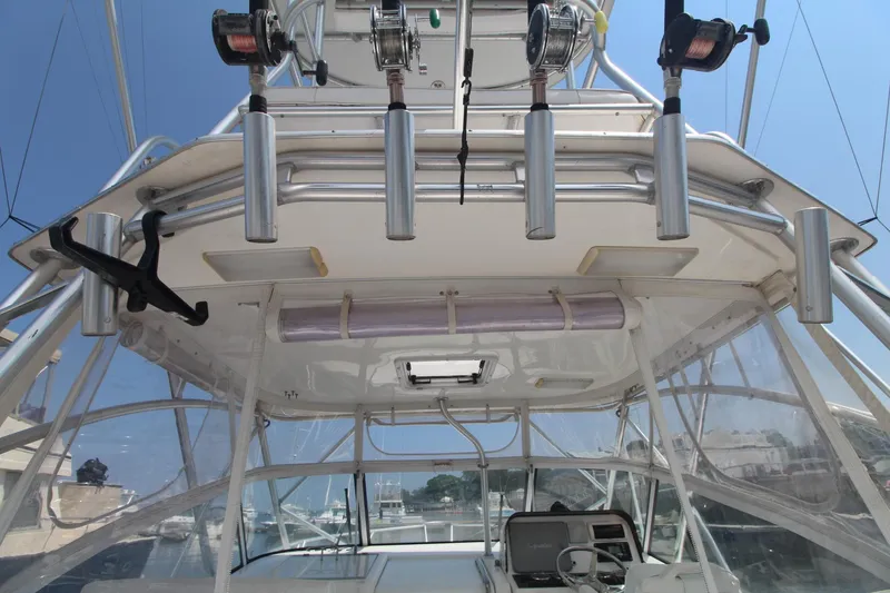 Slide: The Image of 2007 Luhrs 28 Open boat with fishing rods and equipment on deck. - 8