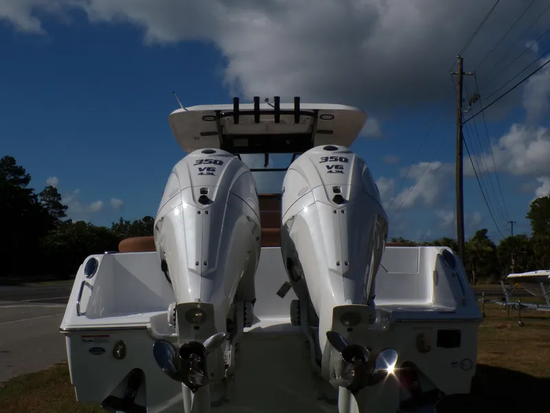 Slide: The Image of 2025 Sea Hunt Ultra 305 SE with twin 350 HP Yamaha outboard engines. - 3