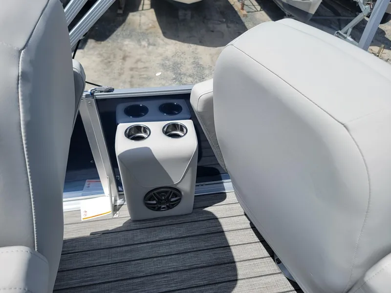 Slide: The Image of Interior of 2025 Harris Cruiser 210 boat with cup holders and speaker. - 21