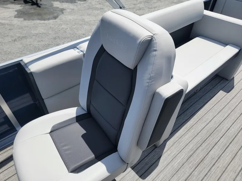 Slide: The Image of 2025 Harris Cruiser 210 boat with comfortable seating and modern design. - 29