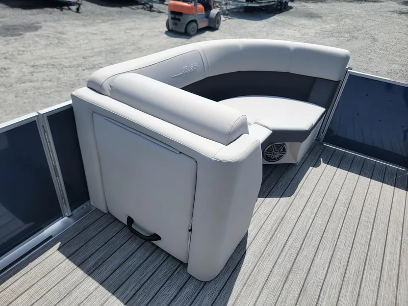 Slide: The Image of 2025 Harris Cruiser 210 boat with gray seating and deck. - 35