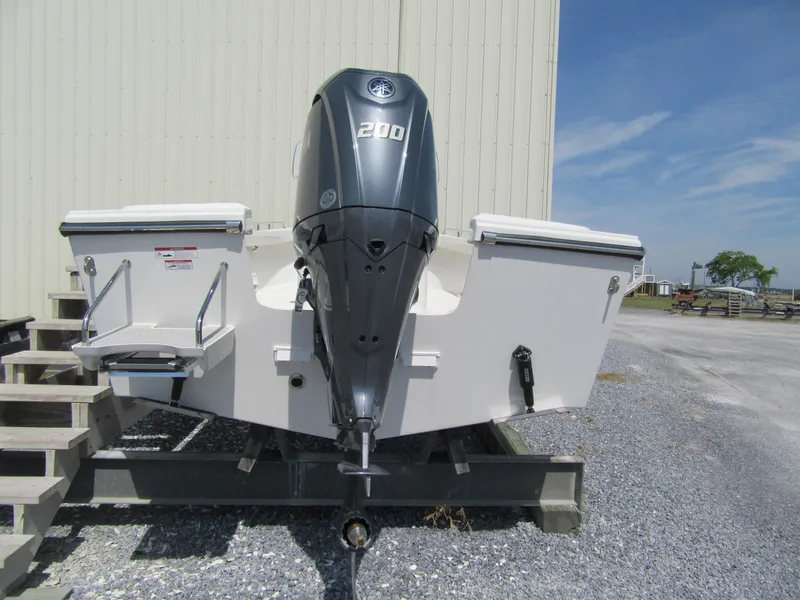 Slide: The Image of 2025 Parker 2300 SE CC boat with 200 HP outboard motor. - 11