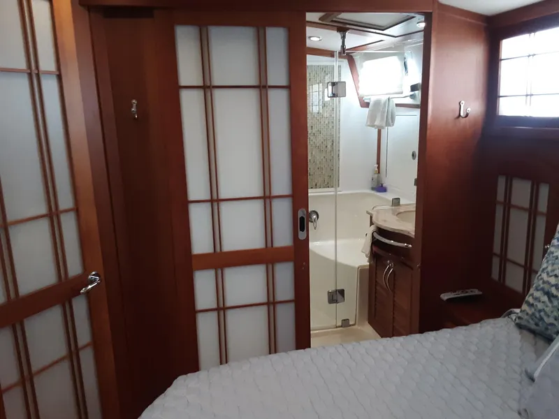 Slide: The Image of Interior of 2016 Sabre 48 Salon Express yacht with bathroom and bedroom. - 24