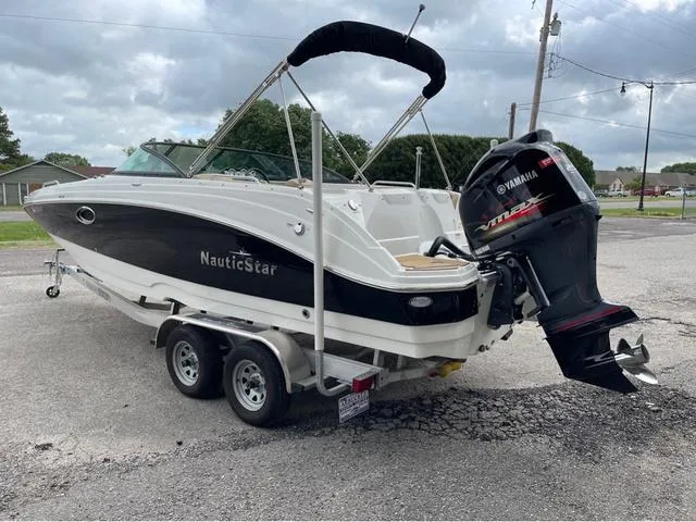 Slide: The Image of 2020 NauticStar 243 DC boat on trailer with Yamaha outboard motor. - 4