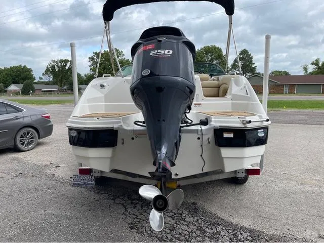 Slide: The Image of 2020 NauticStar 243 DC boat with 250 HP outboard motor, rear view. - 5