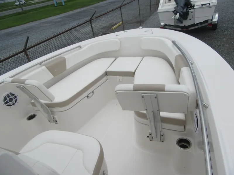 Slide: The Image of 2025 Robalo R200 Center Console boat with spacious seating and modern design. - 5