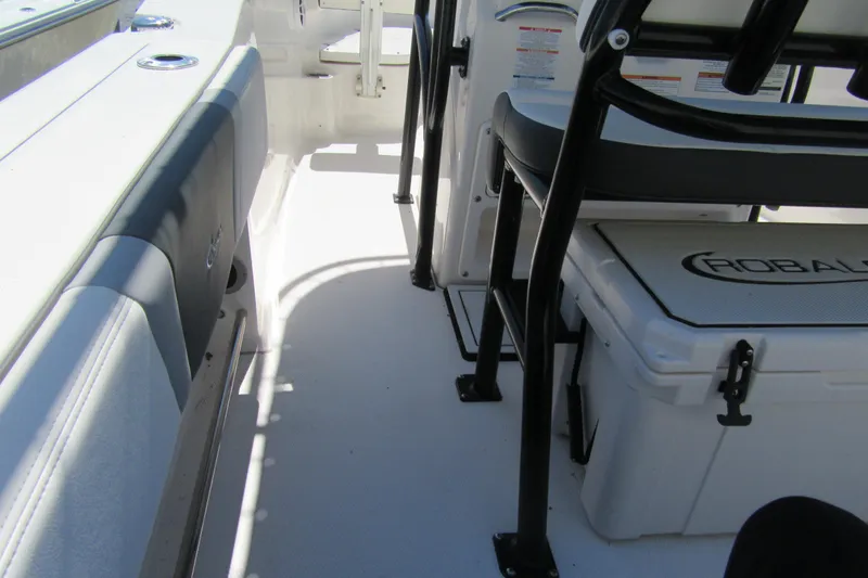 Slide: The Image of 2025 Robalo R200 Center Console interior with seating and storage. - 18