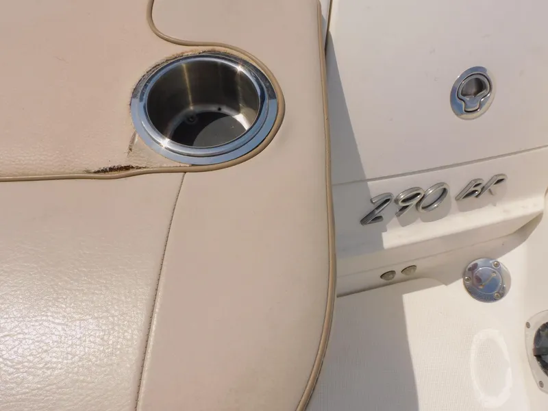 Slide: The Image of 2015 Formula Bowrider 290 interior with cup holder and model emblem. - 18