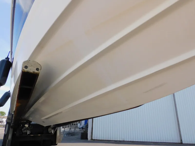 Slide: The Image of 2015 Formula Bowrider 290 boat hull, close-up view, showcasing sleek design. - 7
