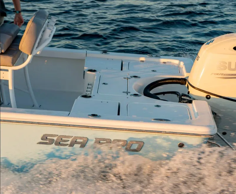 Slide: The Image of 2024 Sea Pro 210 Bay boat cruising on water. - 5