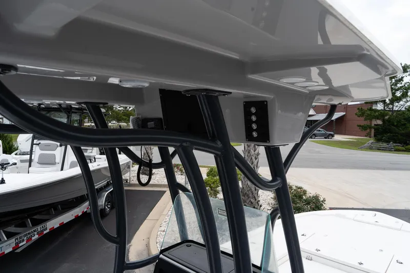 Slide: The Image of 2024 Sea Born FX24 Bay boat console and T-top structure. - 13