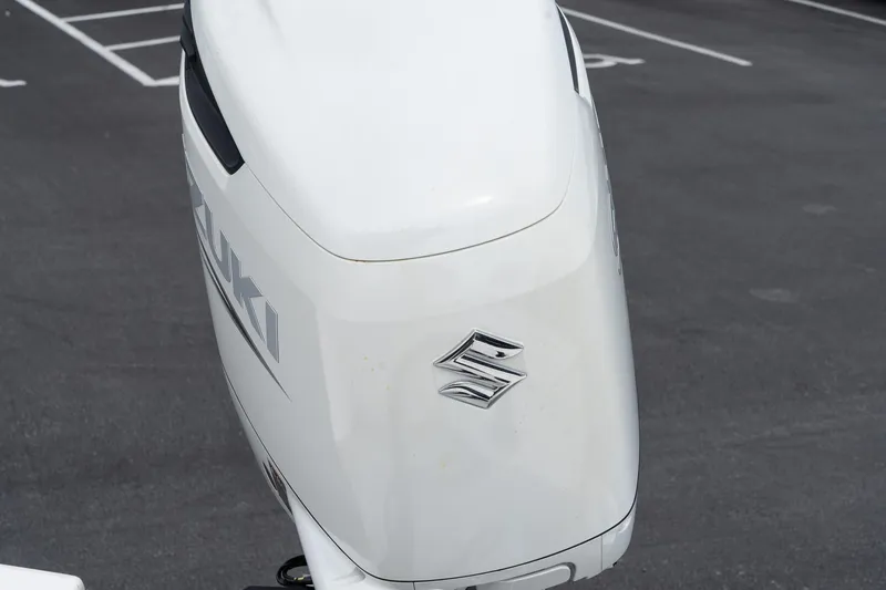 Slide: The Image of 2024 Sea Born FX24 Bay boat with Suzuki outboard motor. - 28