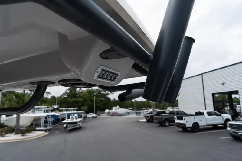 Slide: The Image of 2024 Sea Born FX24 Bay boat detail at a dealership. - 30