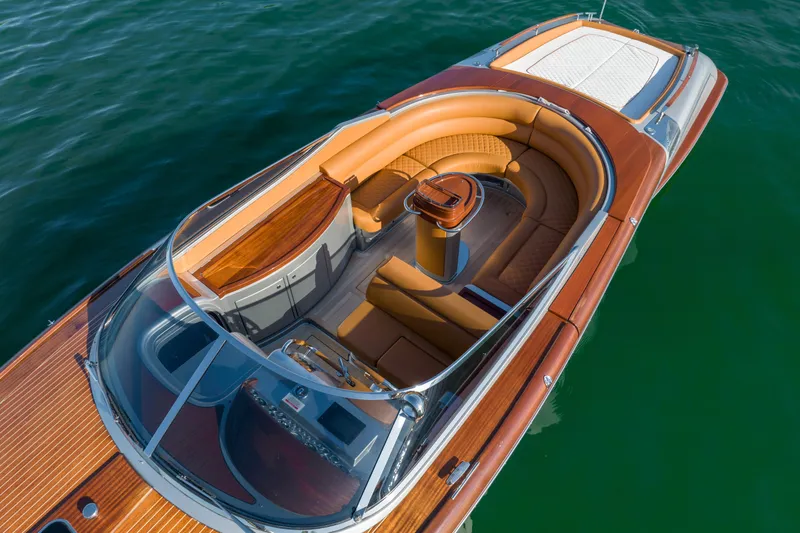 Slide: The Image of 2020 Riva Aquariva Super luxury speedboat with elegant wooden deck and leather seating. - 13