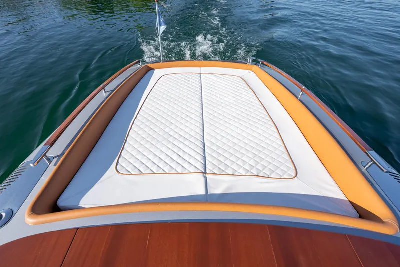 Slide: The Image of Riva Aquariva Super 2020 boat with cushioned sunbathing area on the deck. - 15