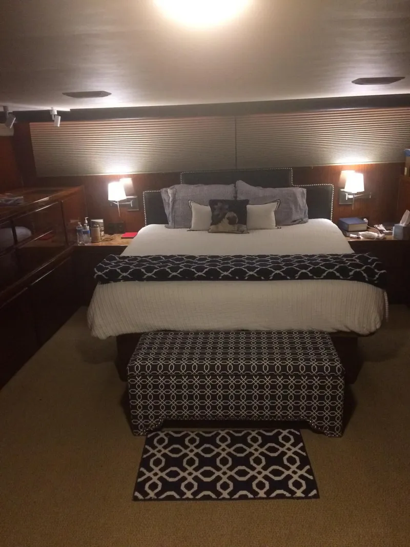 Slide: The Image of Luxurious bedroom in a 1989 Hatteras 70 Cockpit Motor Yacht. - 20