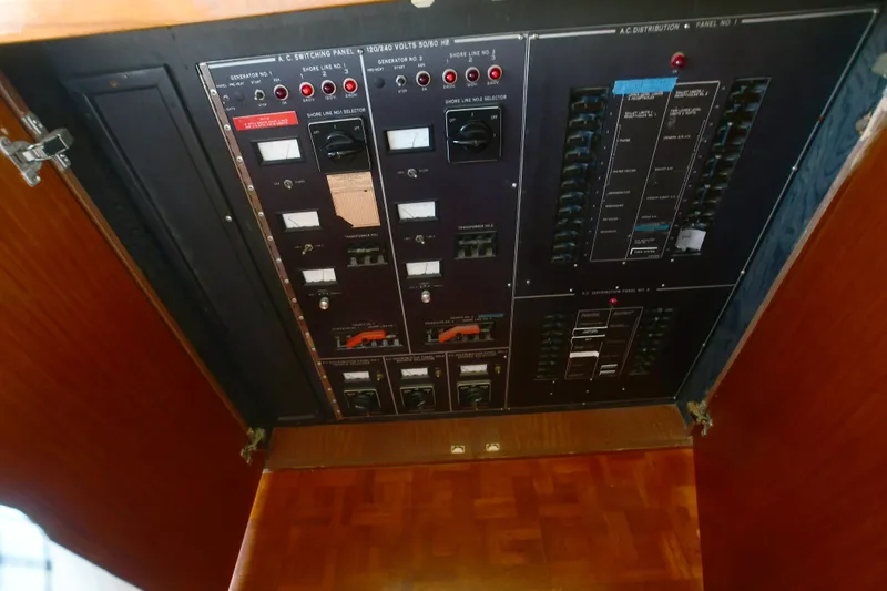 Slide: The Image of Electrical control panel on 1989 Hatteras 70 Cockpit Motor Yacht. - 29
