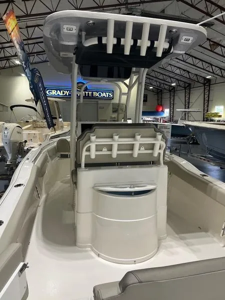 Slide: The Image of 2025 Key West 239 FS boat on display in a showroom. - 6