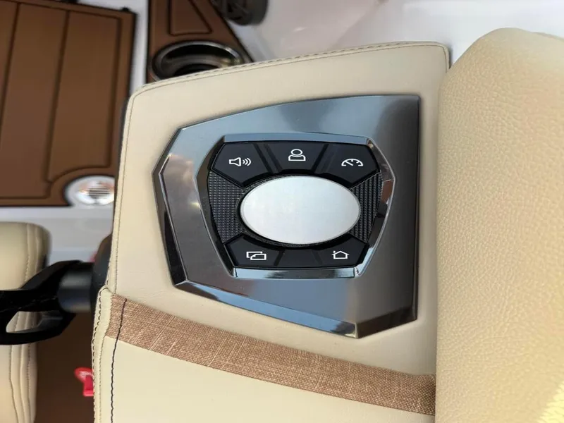 Slide: The Image of Control panel of 2025 Nautique Super Air GS22 boat, featuring sleek design and buttons. - 37