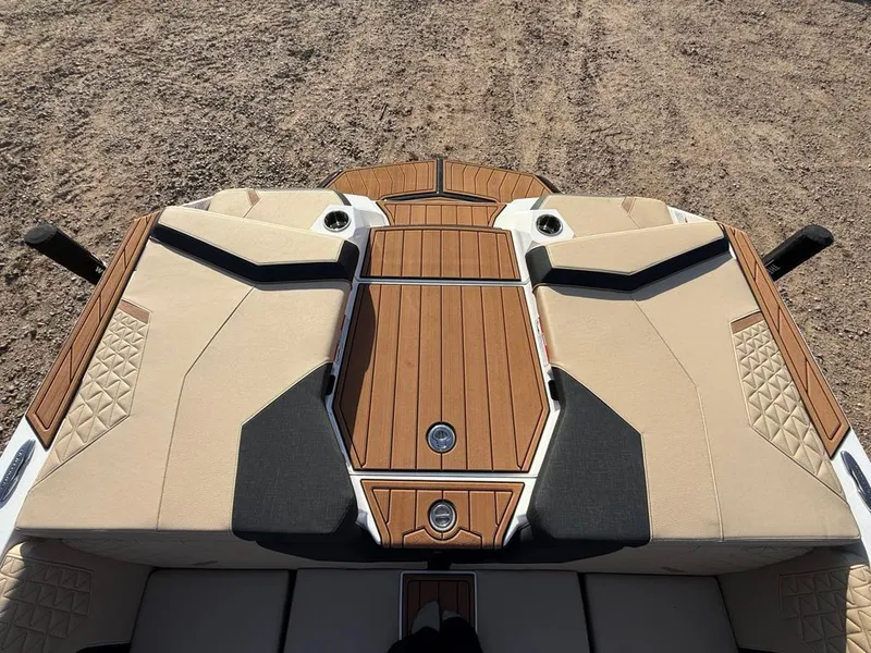 Slide: The Image of 2025 Nautique Super Air GS22 boat with stylish deck design and premium seating. - 40