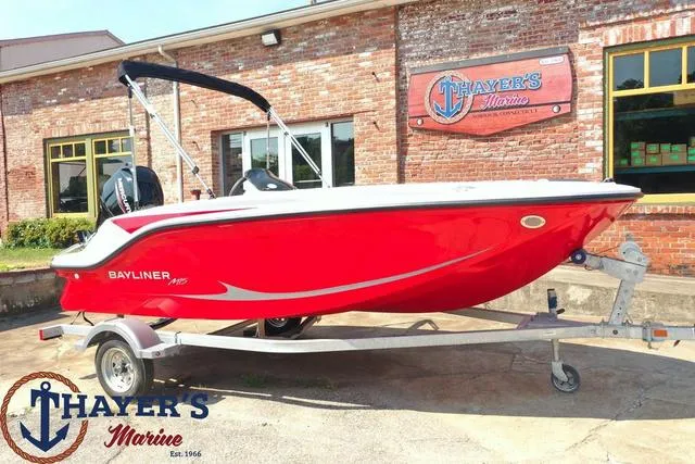 Slide: The Image of 2024 Bayliner M15 boat in red on a trailer at Thayer's Marine. - 12