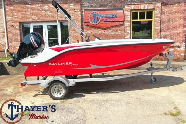 Slide: The Image of 2024 Bayliner M15 boat in red on a trailer at Thayer's Marine. - 13