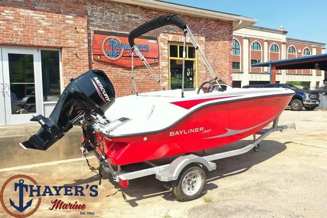 Slide: The Image of 2024 Bayliner M15 boat in red at Thayer's Marine dealership. - 14