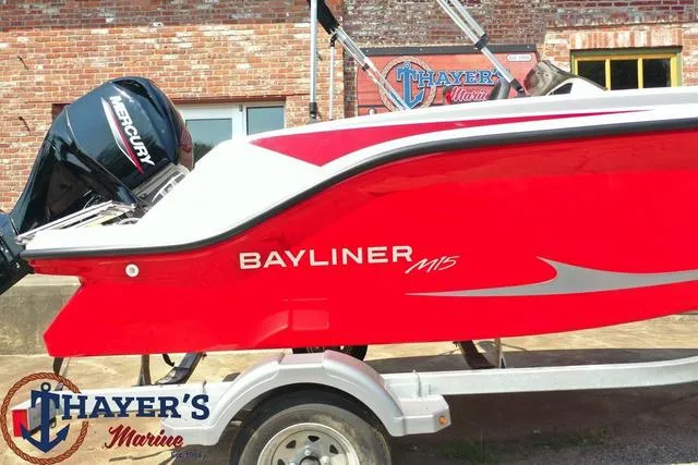 Slide: The Image of 2024 Bayliner M15 boat in red, displayed at Thayer's Marine. - 16