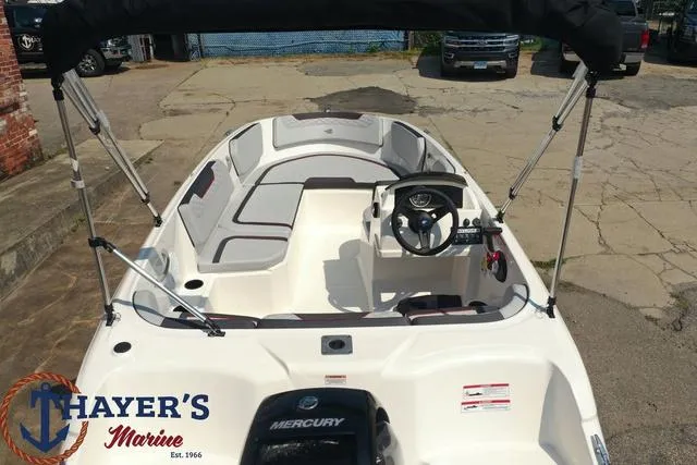 Slide: The Image of 2024 Bayliner M15 boat interior with Mercury engine at Thayer's Marine. - 19