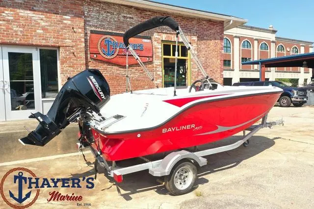 Slide: The Image of 2024 Bayliner M15 boat in red, displayed at Thayer's Marine dealership. - 3